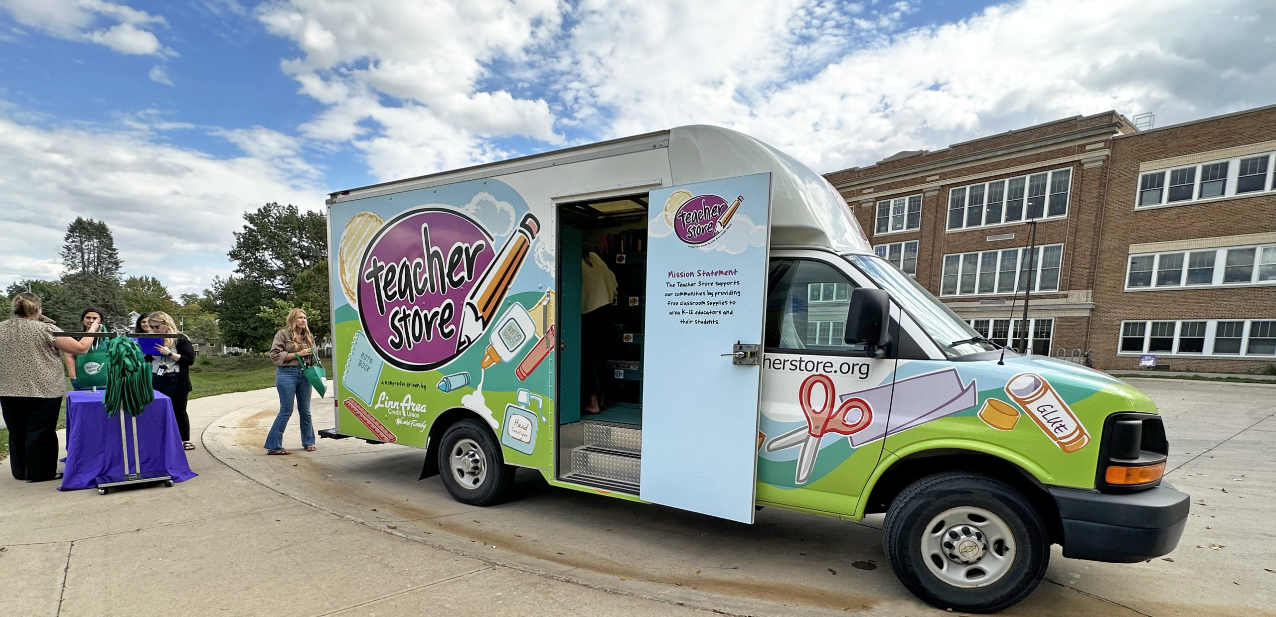 Teacher Store truck parked outside of a school while educators shop for supplies.